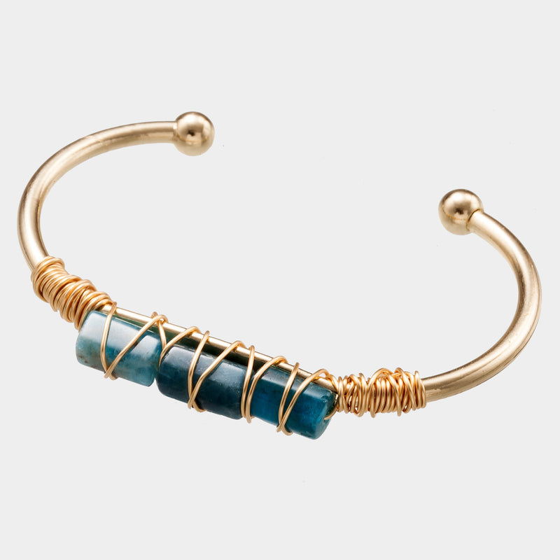 Pulsera de cristal chapada en oro con cristal sinuoso