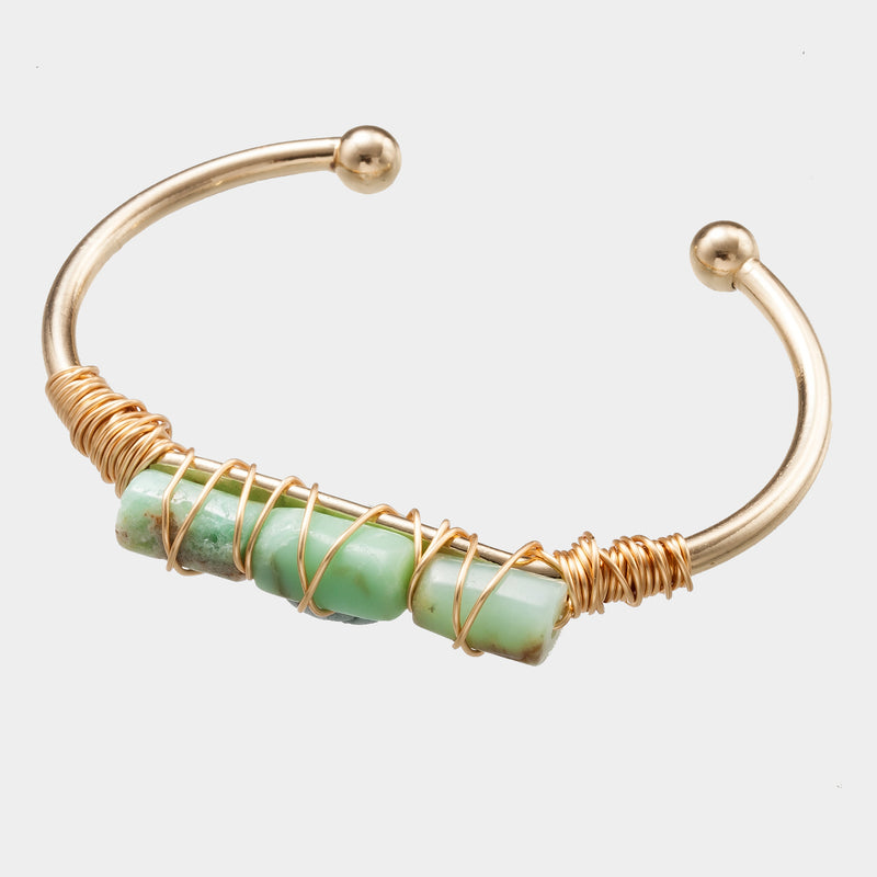 Pulsera de cristal chapada en oro con cristal sinuoso