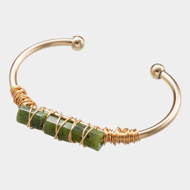 Pulsera de cristal chapada en oro con cristal sinuoso