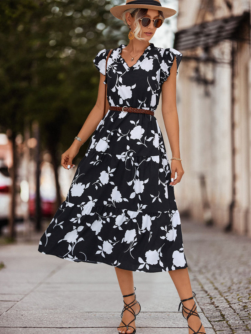 Vestido de mujer con cuello en V y mangas voladoras estampadas