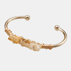 Pulsera de cristal chapada en oro con cristal sinuoso